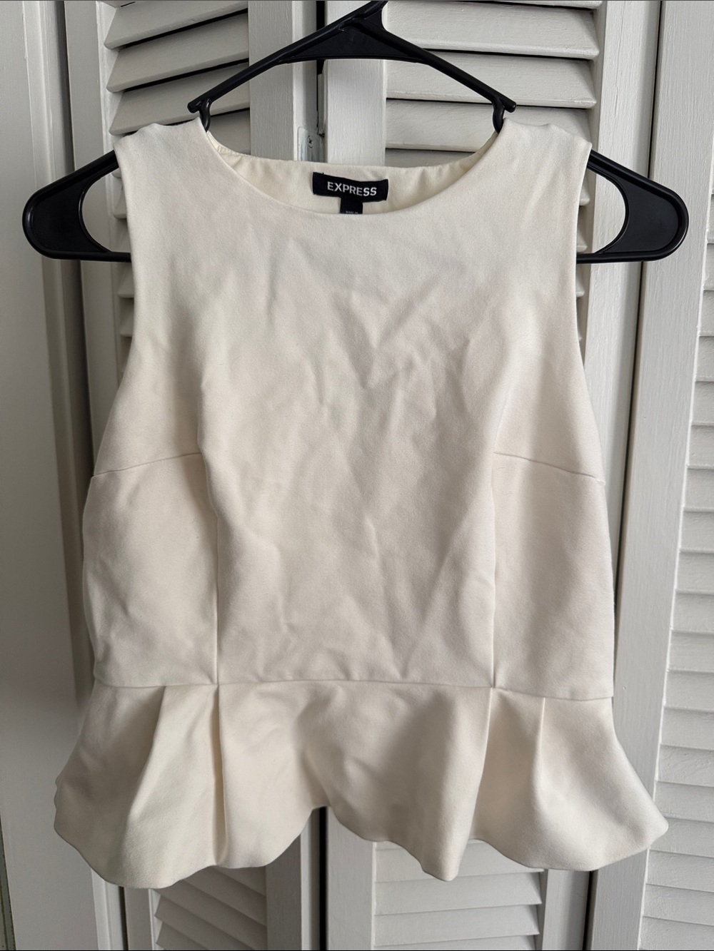 Express Ivory Peplum Sleeveless Top